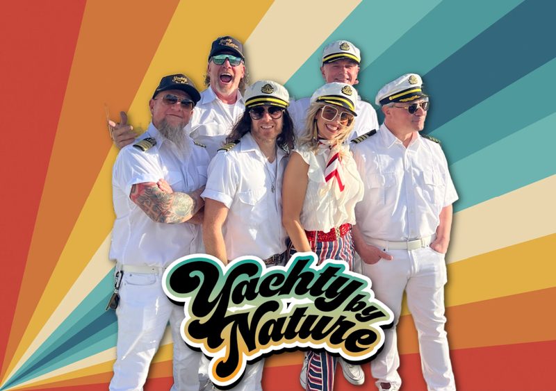 Yachty By Nature in white captain uniforms on a retro sunburst, with the group name along the bottom.